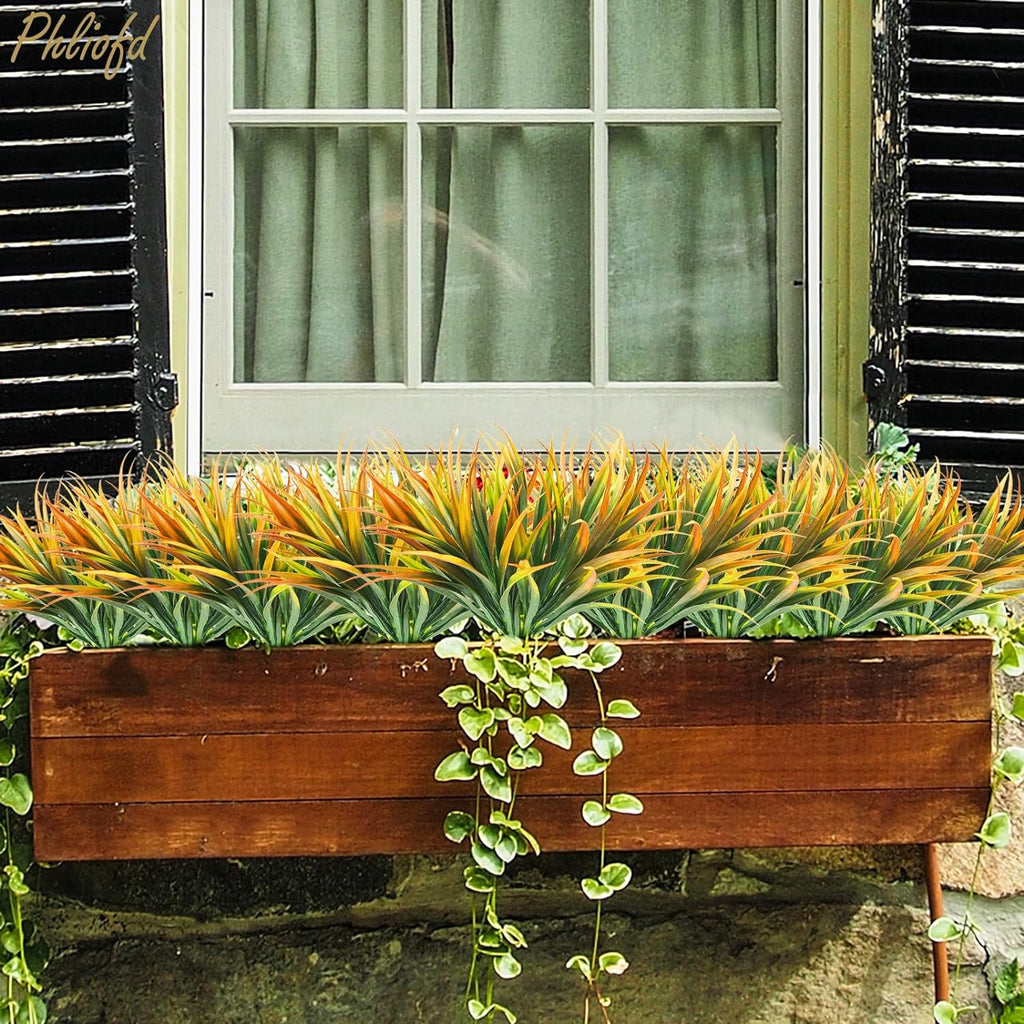 16Pcs Artificial Grass Fake Plants 17.3in Outdoor Plastic Plants UV Resistant Greenery Fake Grass for Home Window Garden Office Patio Hanging Planter Pathway Front Porch Décor Orange Yellow