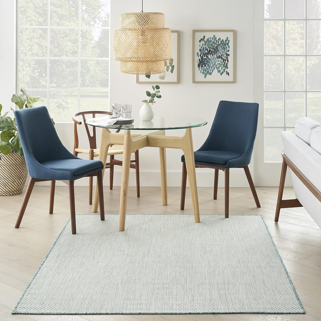 Nourison Home Courtyard 60" x 84" Fabric Indoor/Outdoor Rug in Ivory Aqua