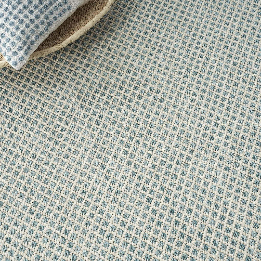 Nourison Home Courtyard 48" x 72" Fabric Indoor/Outdoor Rug in Ivory Aqua