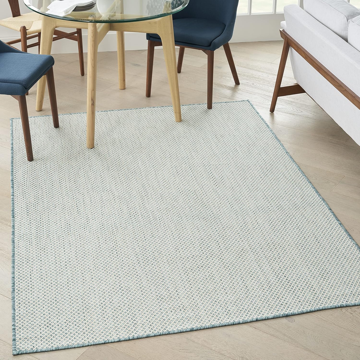 Nourison Home Courtyard 48" x 72" Fabric Indoor/Outdoor Rug in Ivory Aqua