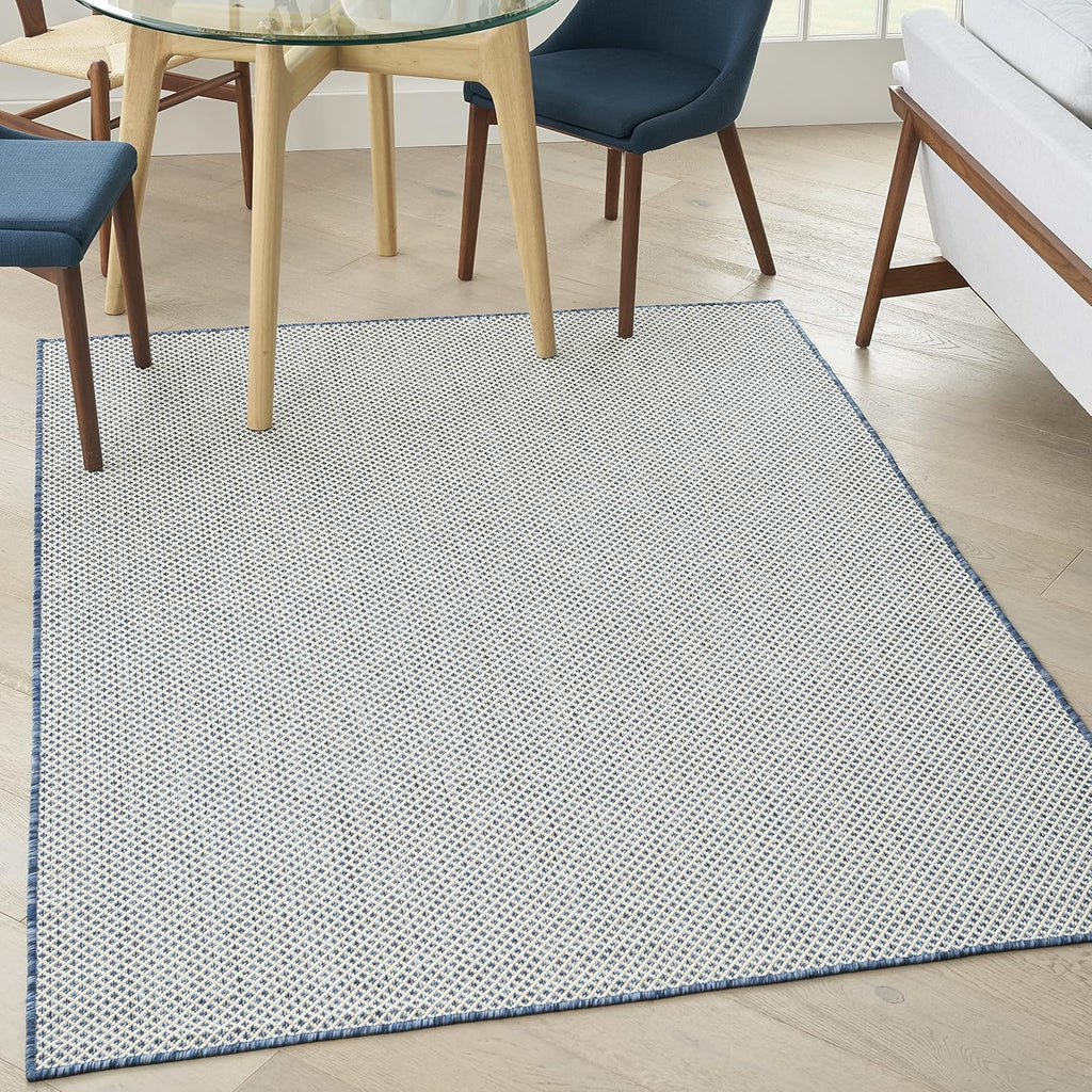 Nourison Home Courtyard 60" x 84" Fabric Indoor/Outdoor Rug in Ivory Blue